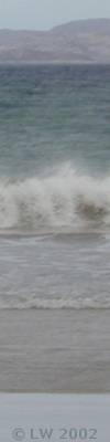 wave breaking on a sandy shore